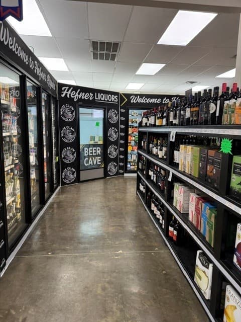 The Beer Cave neon sign at Hefner Liquors